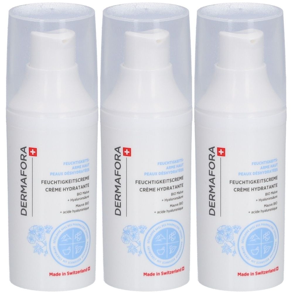 Drei weiße Flaschen mit transparenten Deckeln. Auf jeder Flasche steht "DERMAFORA" und "Feuchtigkeitscreme". Hergestellt in der Schweiz.