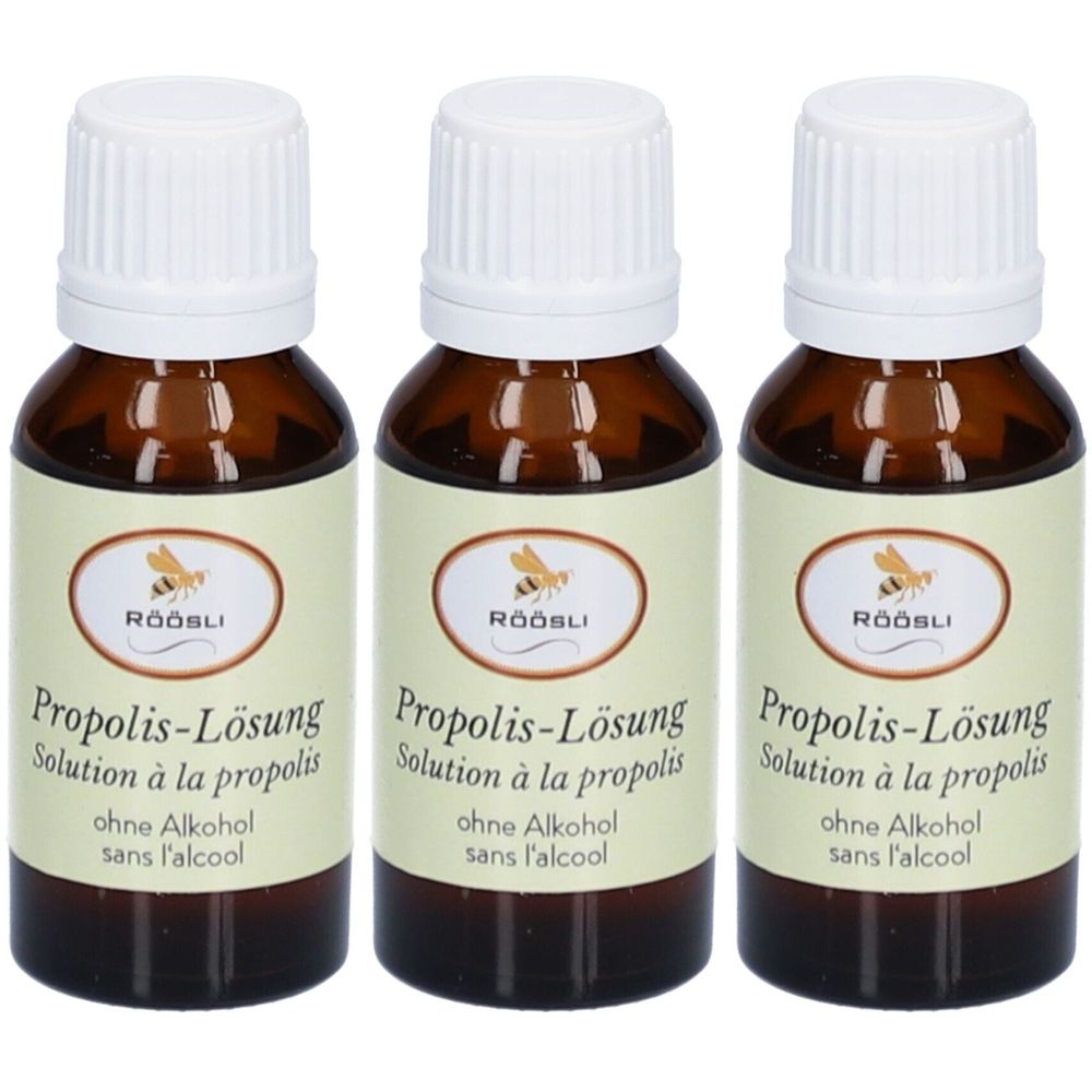 Trois flacons en verre brun avec bouchons blancs. Étiquettes avec texte : Propolis-Lösung, sans alcool. Marque : RÖÖSLI.