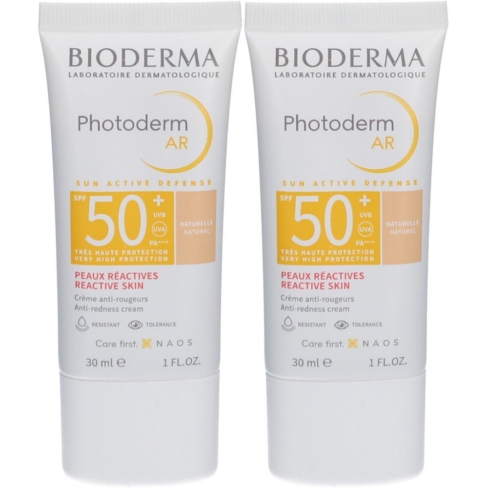 Zwei Tuben BIODERMA Photoderm AR. Weiß, mit gelben und beigen Akzenten. Aufschrift: SPF 50, Peaux Réactives, 30 ml.