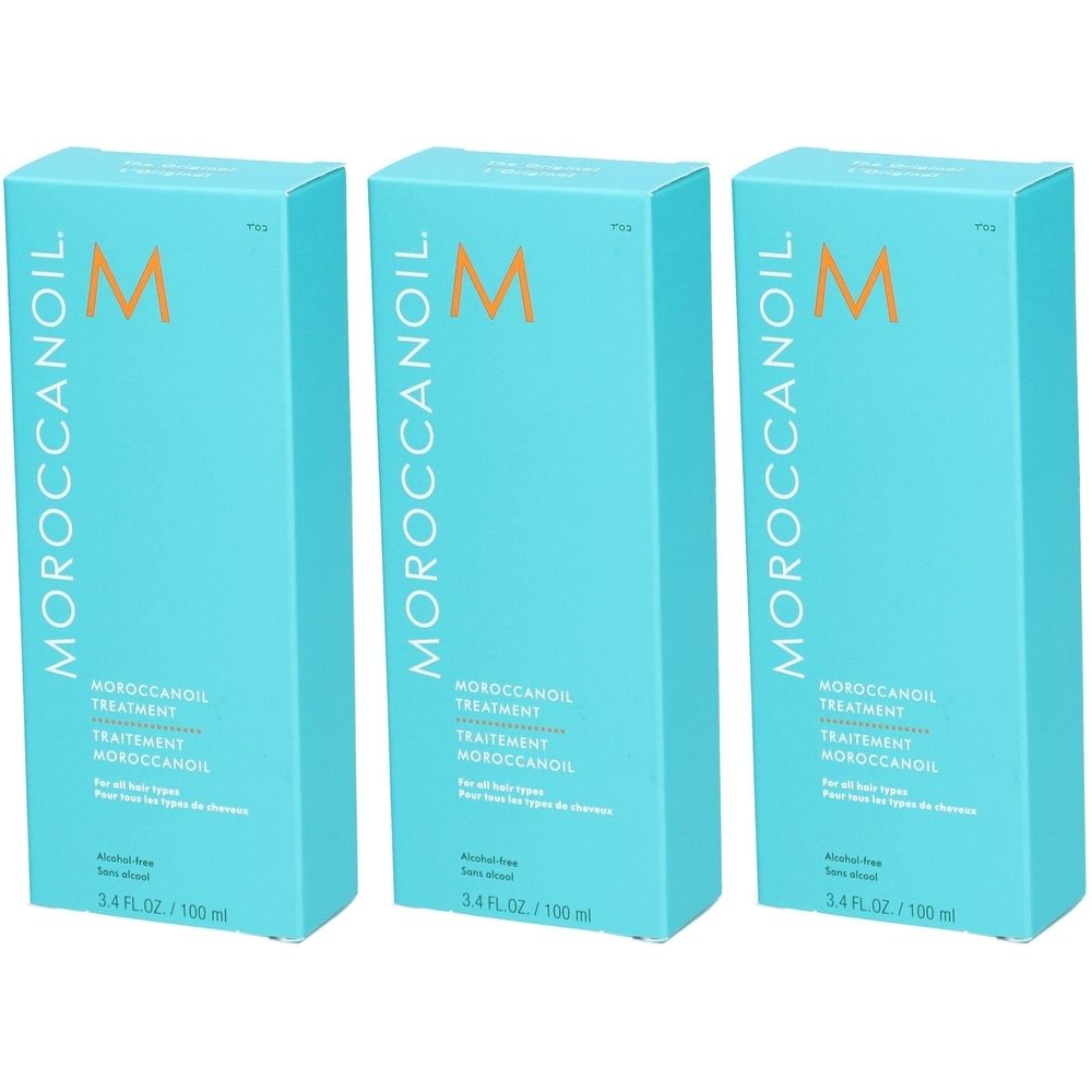 Drei türkisfarbene Schachteln mit dem Schriftzug MOROCCANOIL. Auf jeder Schachtel steht "Treatment" und "3.4 FL. OZ / 100 ml".