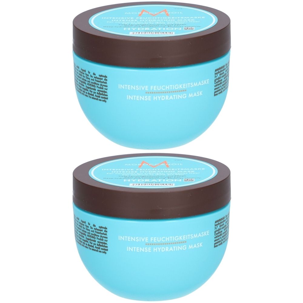 Deux pots bleus avec couvercles marron. Inscription : Intensive Feuchtigkeitsmaske, Intense Hydrating Mask. Logo.