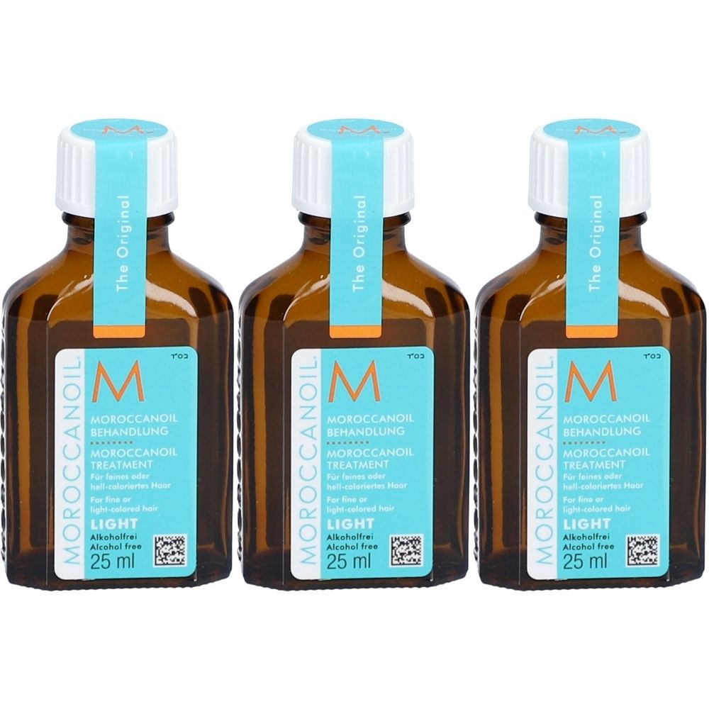Trois flacons Moroccanoil Light. Flacons en verre brun avec étiquette bleu et blanche. Inscription: Moroccanoil Treatment, 25 ml.