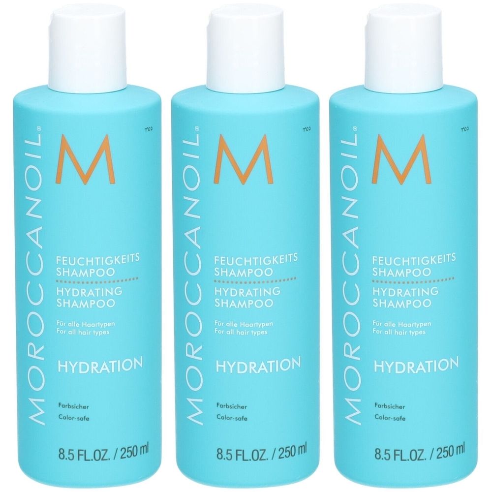 Drei türkisfarbene Flaschen mit weißem Deckel. Aufschrift: Moroccanoil, Feuchtigkeit Shampoo, Hydrating Shampoo. 8.5 FL.OZ./250 ml.
