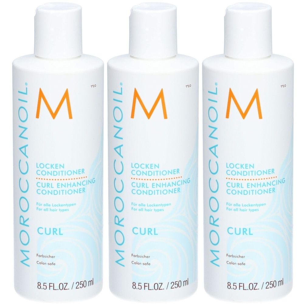 Trois bouteilles blanches avec bouchons blancs. Inscription: Moroccanoil Locken-Conditioner. Logo orange. 8.5 FL.OZ./250 ml.