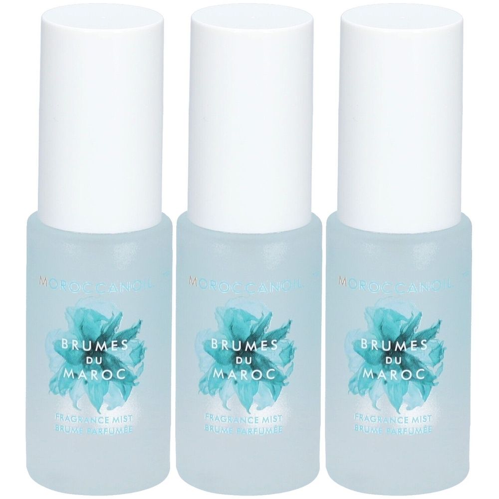 Trois flacons avec bouchon blanc. Inscription: BRUMES DU MAROC. Fleur bleu-turquoise sur le flacon.