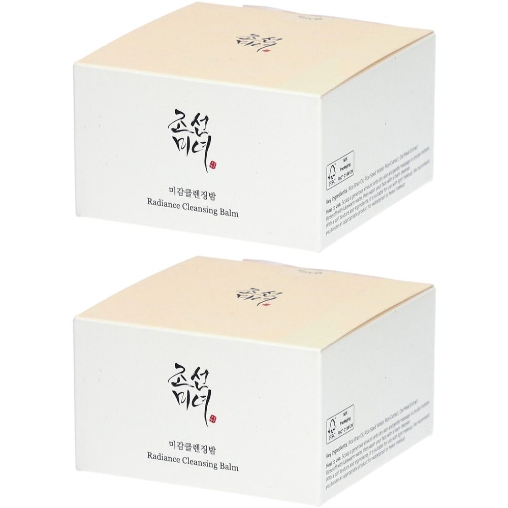 Deux boîtes carrées avec couvercles crème. Texte coréen et "Radiance Cleansing Balm" sur le devant. Marque de certification sur le côté.
