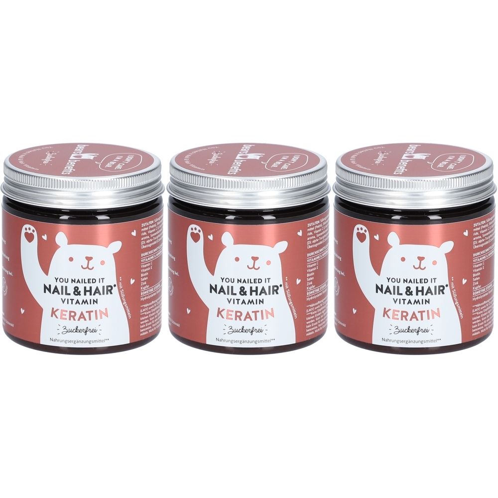 Drei braune Gläser mit silbernen Deckeln. Auf jedem Glas steht "YOU NAILED IT NAIL & HAIR VITAMIN KERATIN".