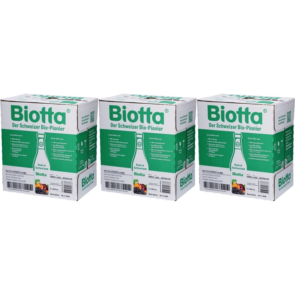 Trois cartons Biotta. Inscription: Le pionnier bio suisse. Emballage vert et blanc avec illustration du produit.