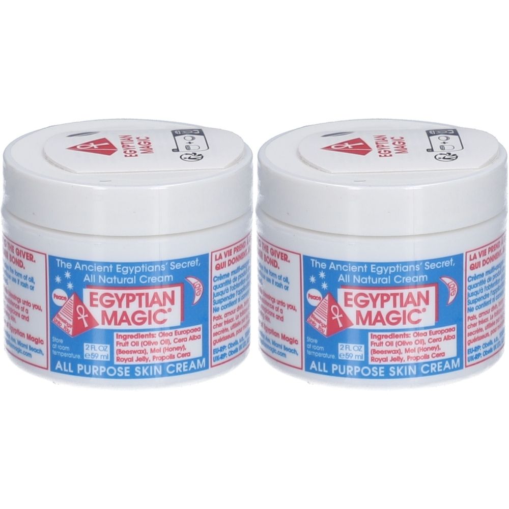Deux pots blancs avec couvercles. Inscription : Egyptian Magic, All Purpose Skin Cream. Étiquettes bleues et rouges.