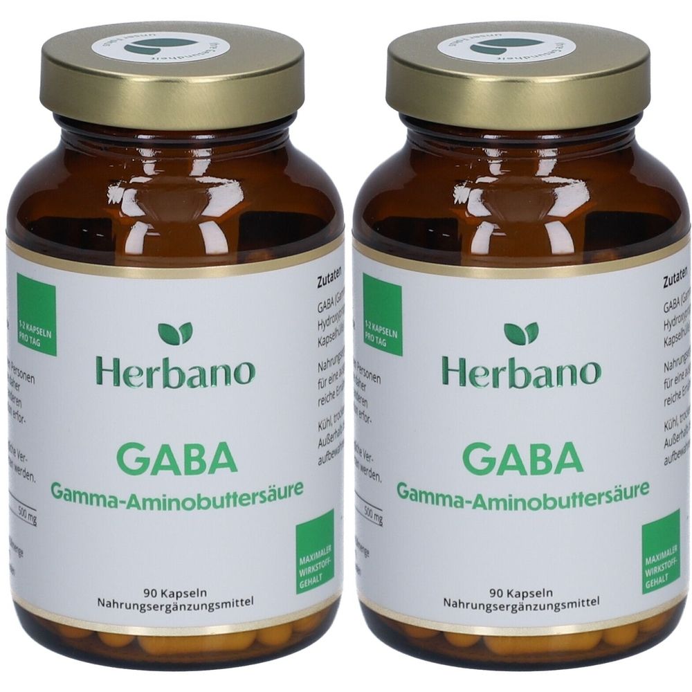 Deux flacons en verre brun avec des couvercles dorés. Les étiquettes indiquent "Herbano GABA Gamma-Aminobuttersäure". Chaque flacon contient 90 gélules.