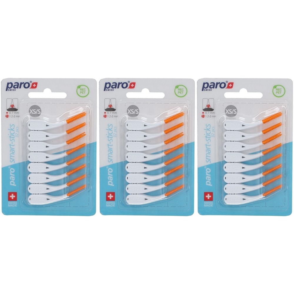 Drei Packungen Paro Smart-Sticks XS/S. Jede Packung enthält weiße, orangefarbene Interdentalbürsten. Schweizer Flagge und Logo.