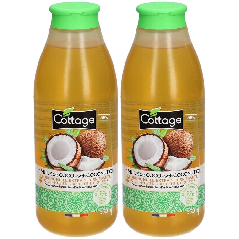 Zwei Flaschen Duschöl mit Kokosöl. Grüner Deckel, gelbe Flüssigkeit. Marke: Cottage. Aufschrift: Douche Huile Extra Nourrissante.