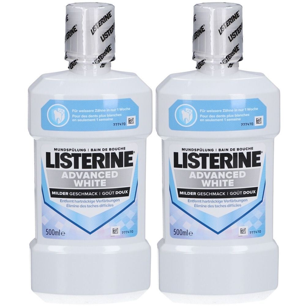 Deux flacons de bain de bouche. Étiquette blanche avec inscription Listerine Advanced White. 500ml.