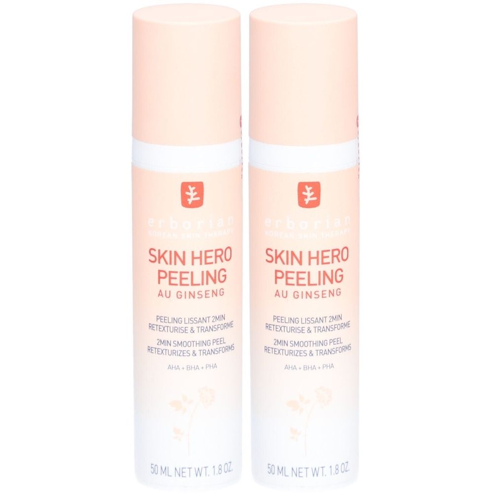 Deux flacons de peeling Erborian Skin Hero. Flacons beige rosé avec bouchon blanc. Inscription : Skin Hero Peeling, Au Ginseng.