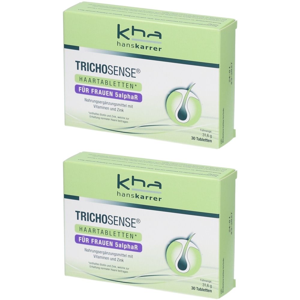 Zwei grüne Schachteln mit "TRICHOSENSE HAARTABLETTEN" Aufschrift. Marke: kha hans karrer. Abbildung eines Haares.