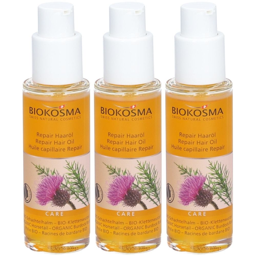 Trois flacons d'huile capillaire avec bouchons blancs. Inscription: BIOKOSMA, Repair Hair Oil. Illustration d'une fleur violette.