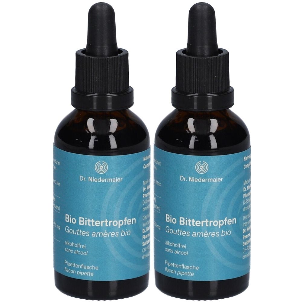 Zwei braune Glasflaschen mit schwarzen Pipetten. Blaue Etiketten mit Text: "Bio Bittertropfen", "Dr. Niedermaier".