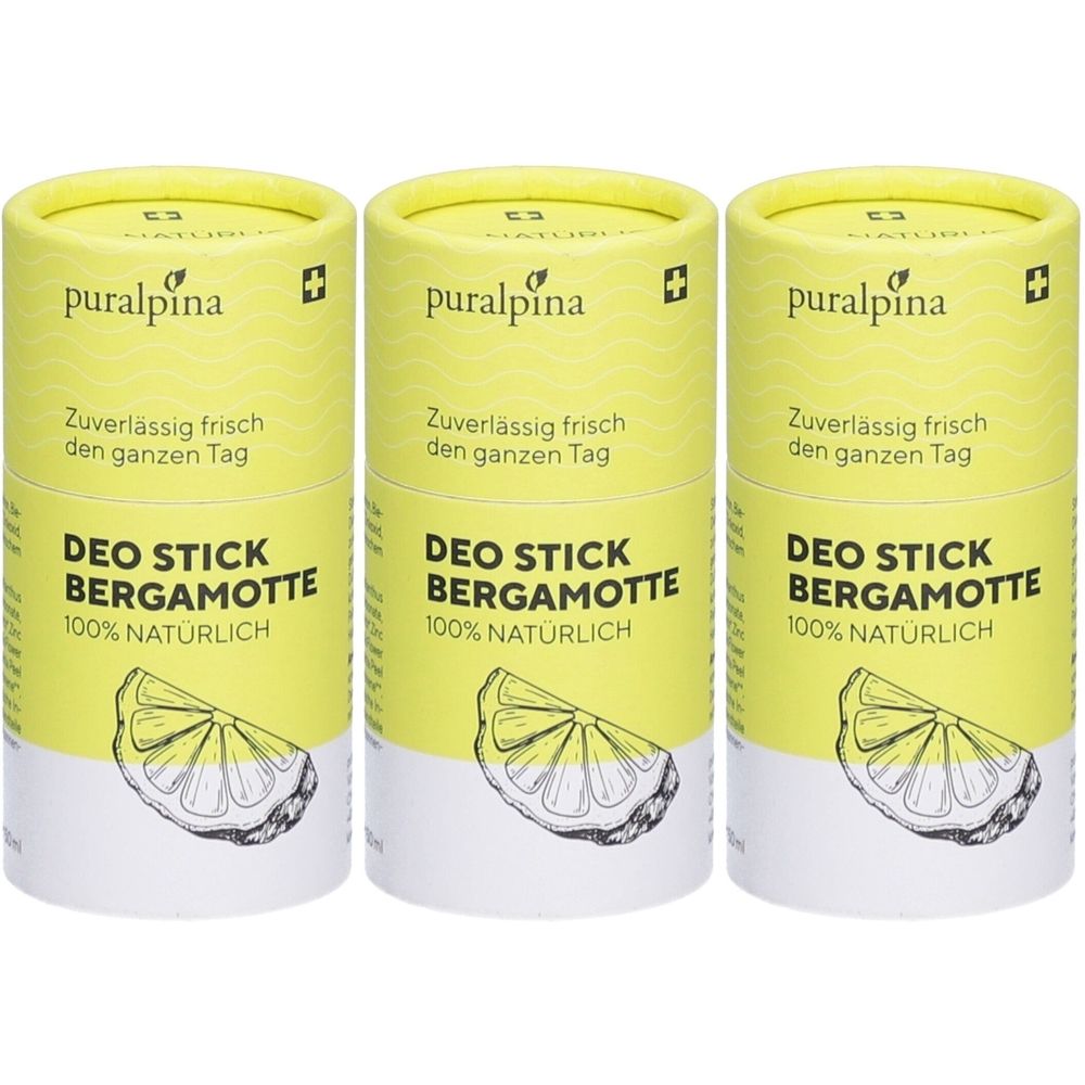 Trois bâtonnets déodorants cylindriques avec étiquette jaune. Inscription : puralpina, DEO STICK BERGAMOTTE, 100% NATÜRLICH. Croix suisse.