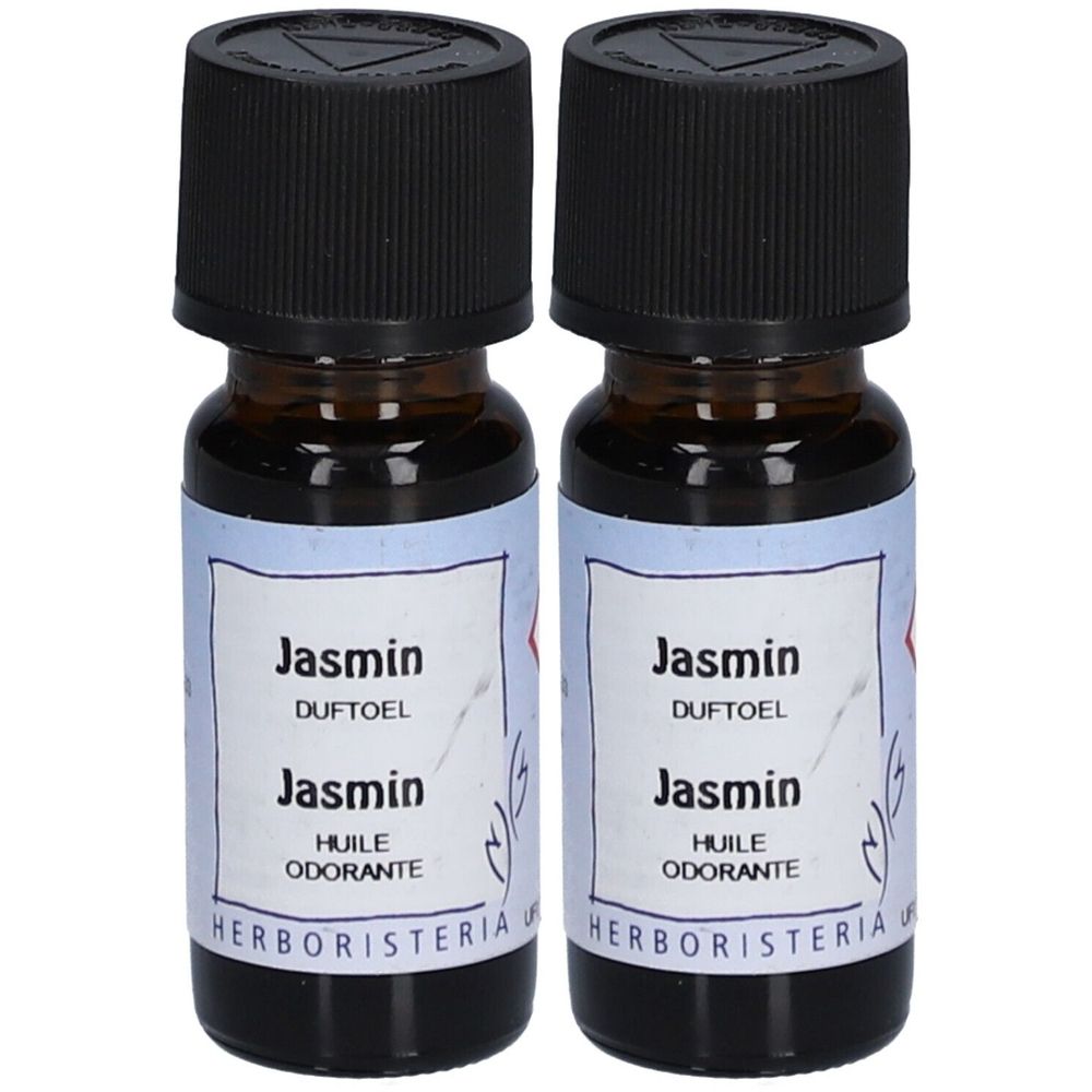 Zwei kleine braune Glasflaschen mit schwarzem Deckel. Auf den Etiketten steht "Jasmin" und "HERBORISTERIA".