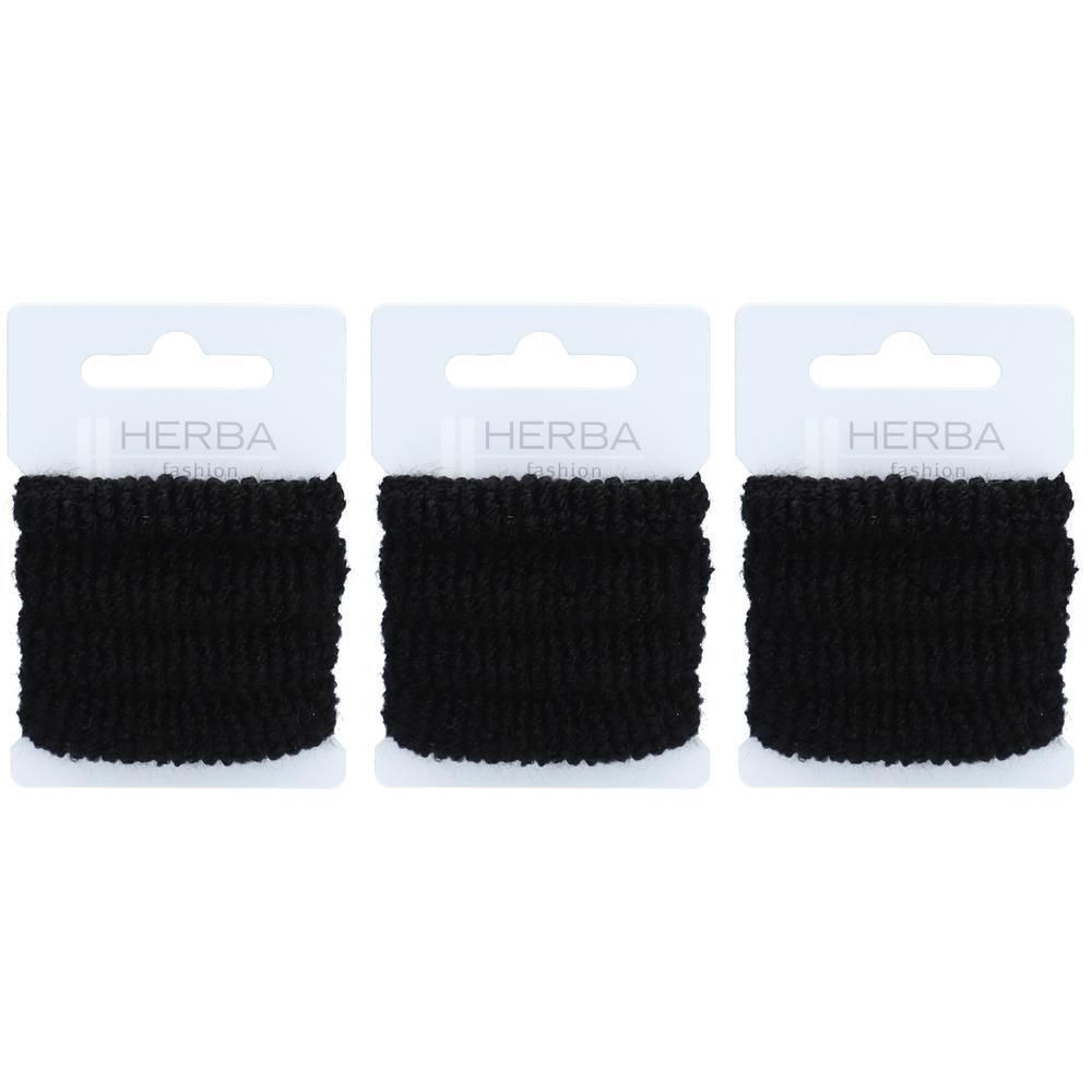 Trois élastiques noirs sur carton blanc. Logo HERBA en haut. Texture tissée, enroulée.