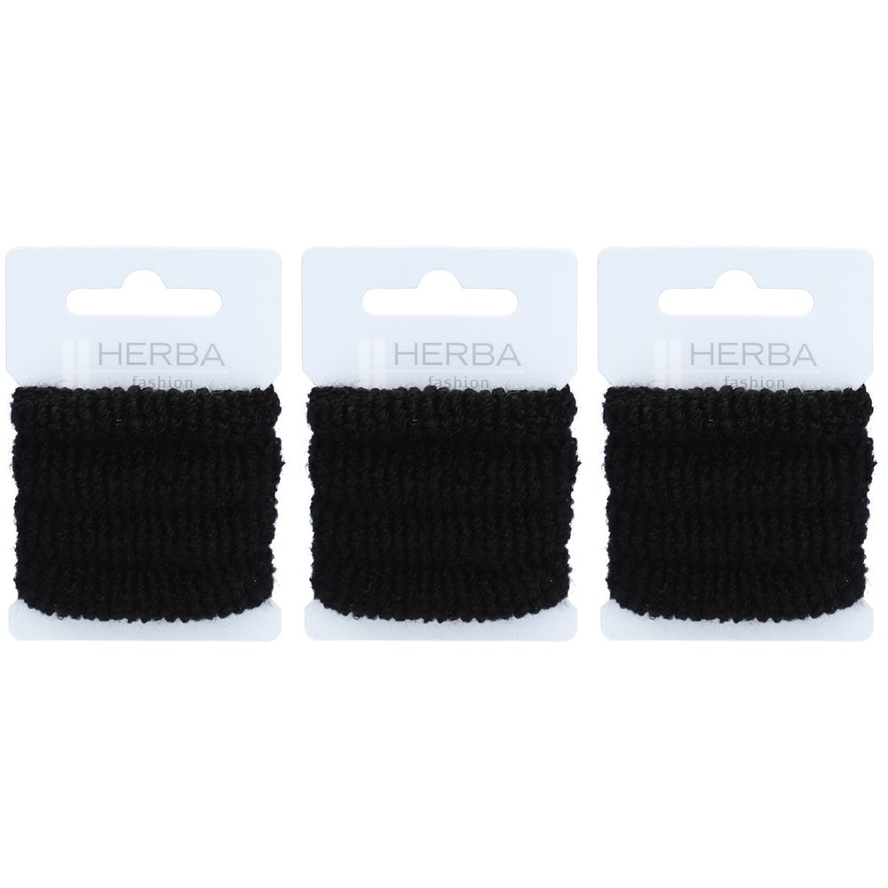 Trois élastiques noirs HERBA, emballés sur carton blanc. Chaque élastique est enroulé.