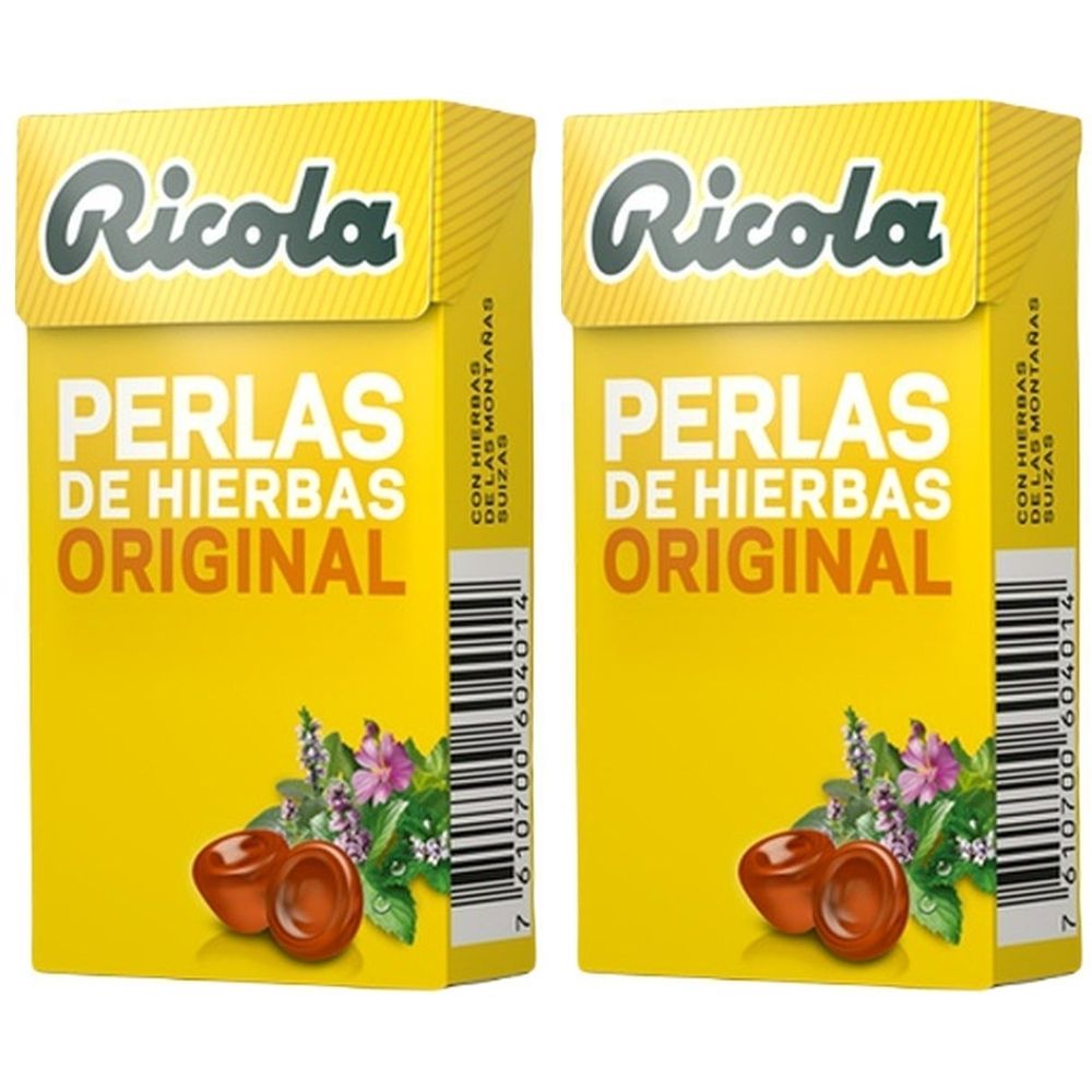 Zwei gelbe Schachteln mit "Ricola"-Logo und Aufschrift "Perlas de Hierbas Original". Abbildung von Kräutern und Bonbons.