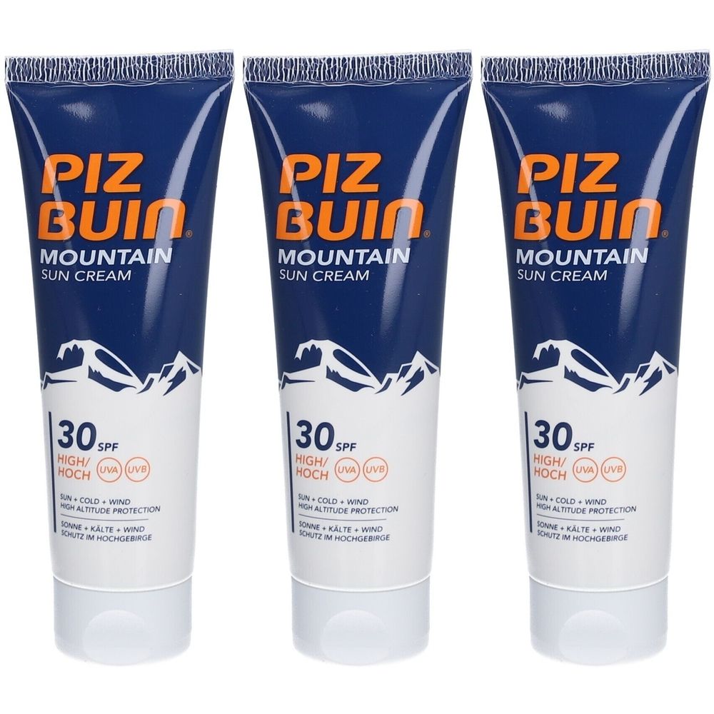 Trois tubes de crème solaire Piz Buin Mountain SPF30. Tubes bleus avec bouchons blancs. Inscription : Piz Buin, Mountain Sun Cream, 30 SPF.