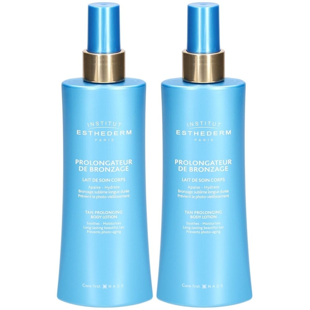 Zwei blaue Flaschen mit Sprühkopf. Aufschrift: INSTITUT ESTHEDERM, PROLONGATEUR DE BRONZAGE, TAN PROLONGING BODY LOTION.