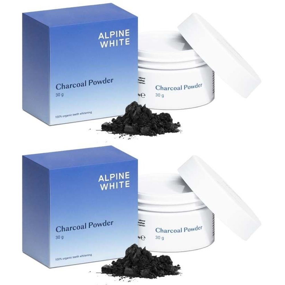 Zwei Packungen und Tiegel mit Kohlepulver. Blaue Schachteln mit "ALPINE WHITE" und "Charcoal Powder". Weiße Tiegel mit Deckel und Pulver.