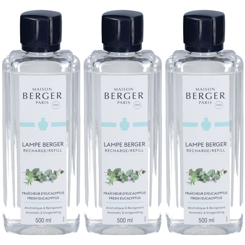 Trois flacons avec bouchons noirs. L'étiquette indique "MAISON BERGER PARIS" et "LAMPE BERGER RECHARGE/REFILL".
