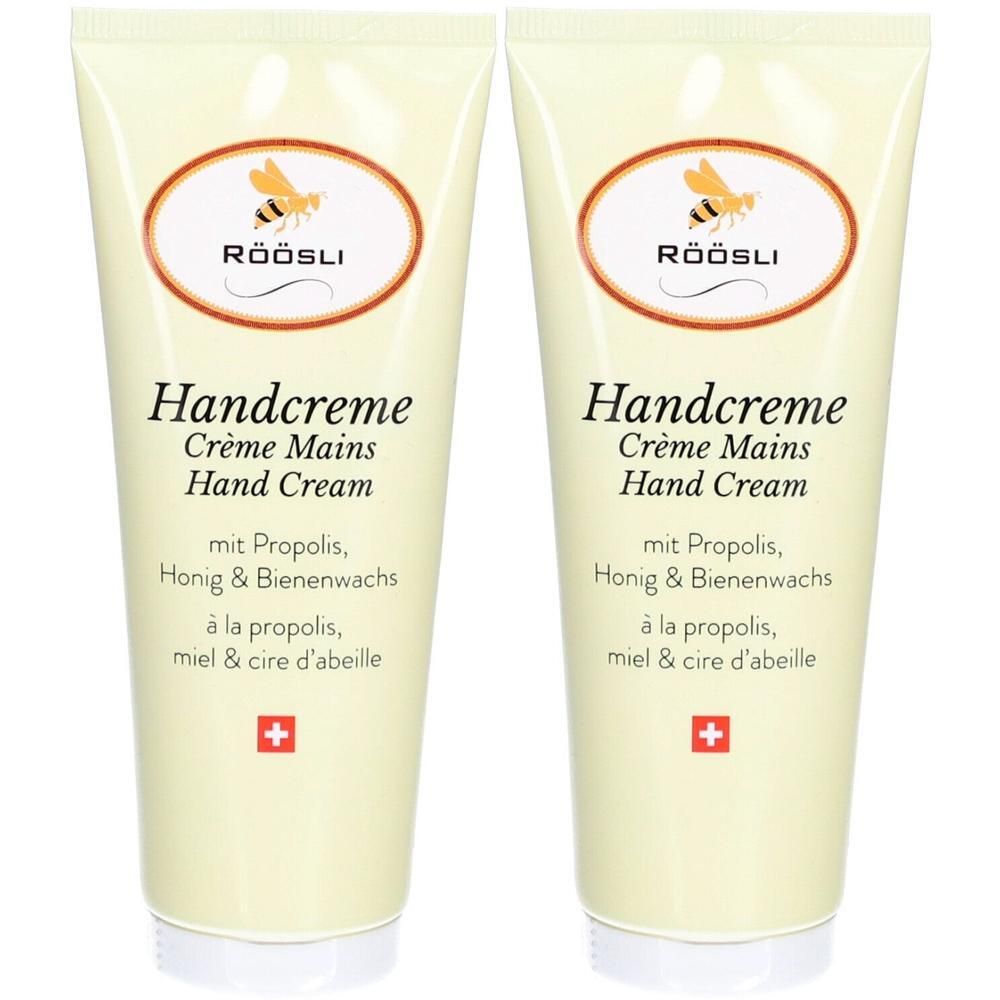 Deux tubes de crème pour les mains. Inscription: Handcreme, Crème Mains, Hand Cream. Avec propolis, miel et cire d'abeille. Croix suisse.