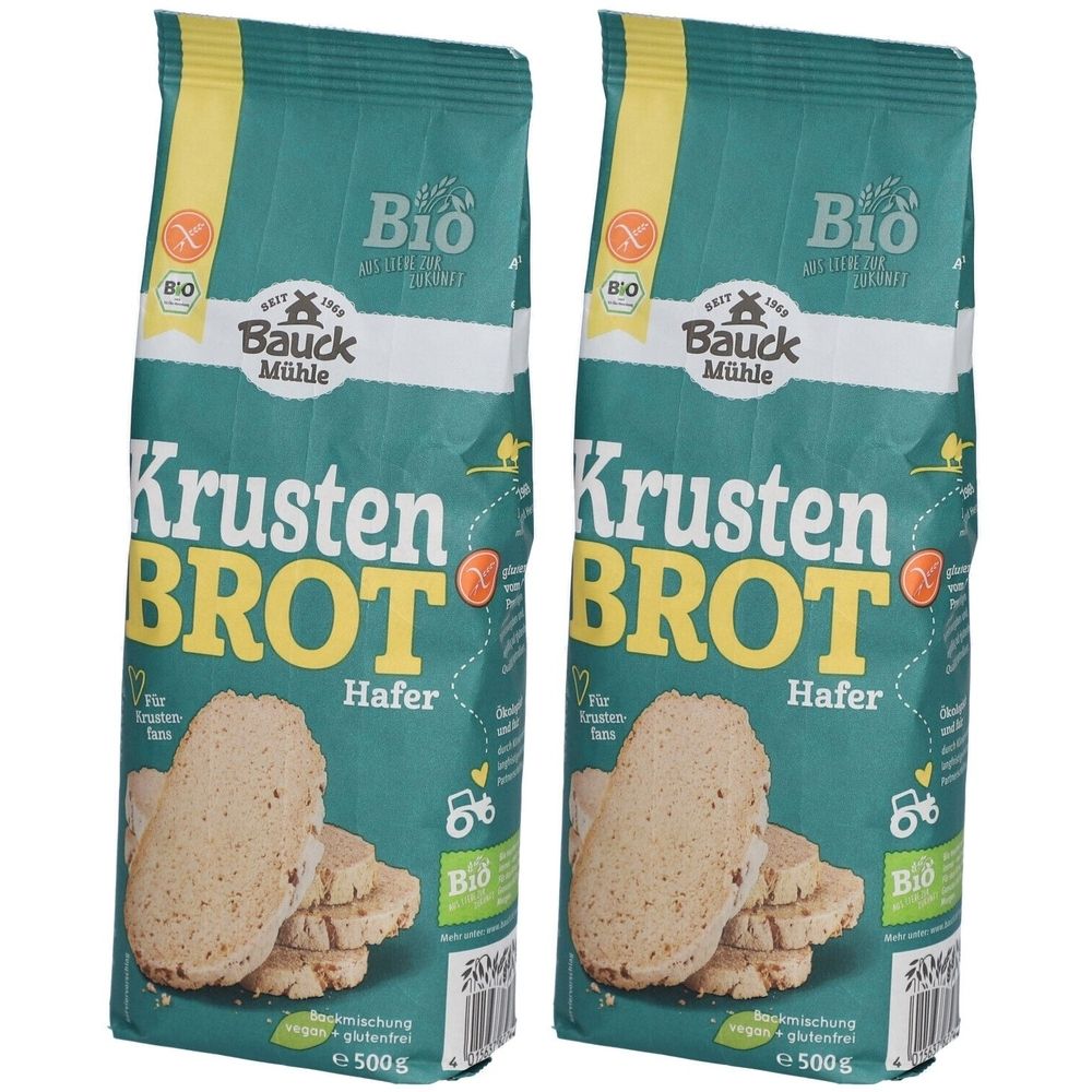 Zwei Beutel Krustenbrot Hafer Bio-Kochmischung. Grün-weiße Verpackung mit Produktnamen und Bio-Siegel. Brotstücke abgebildet.