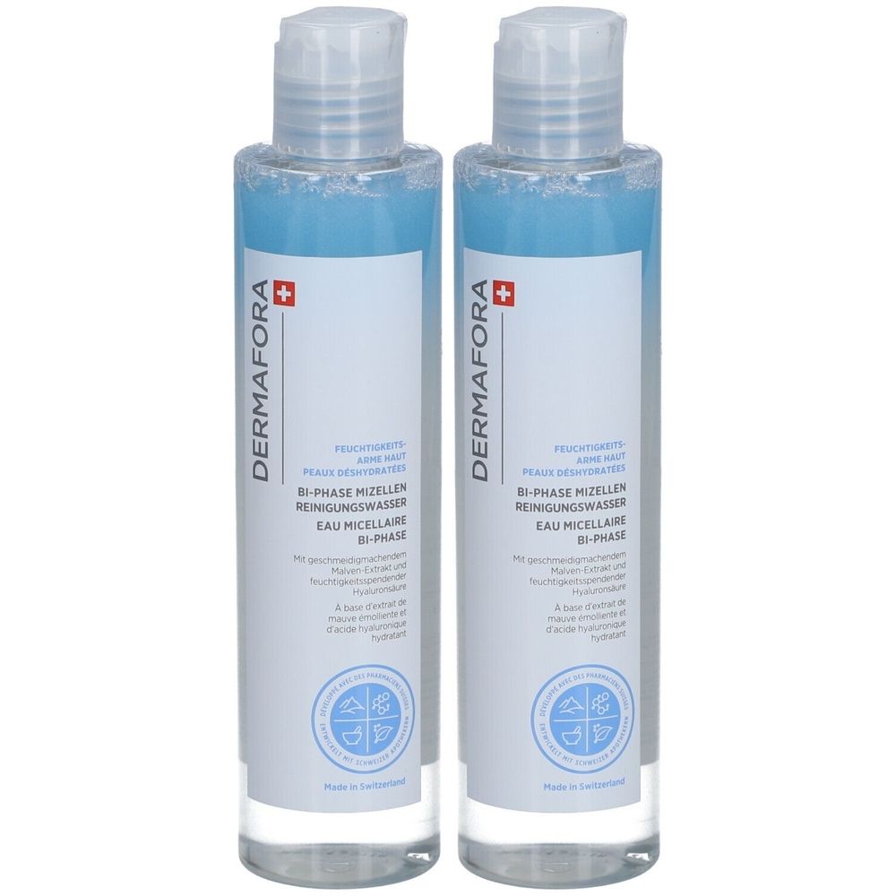 Deux flacons de DERMAFORA Eau Micellaire Bi-Phase. Liquide bleu dans des flacons transparents avec bouchon blanc et étiquette.