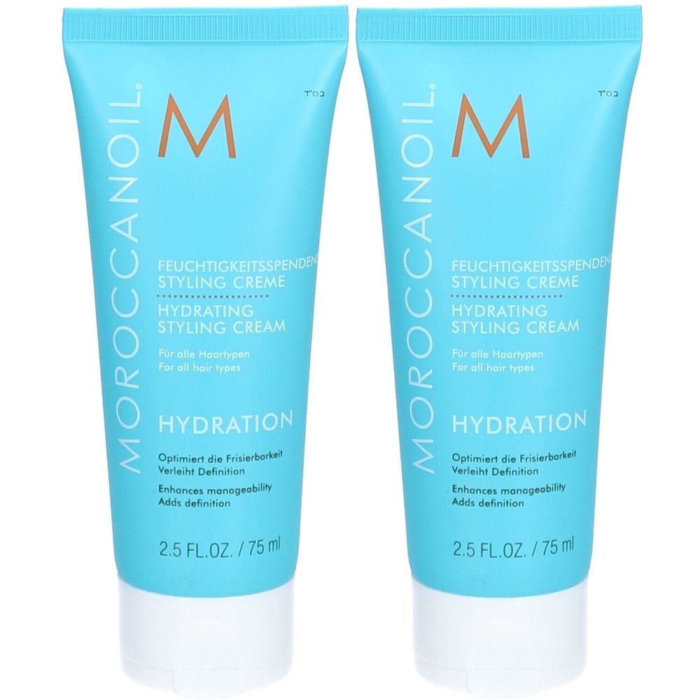 Zwei blaue Tuben mit weißem Deckel. Aufschrift: Moroccanoil, Styling Creme, Hydration. Enthält 75 ml.