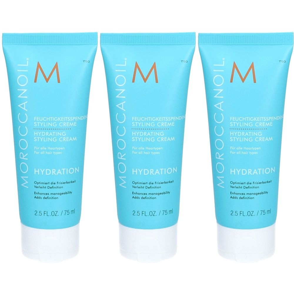 Drei blaue Tuben mit weißer Schrift. Auf jeder steht "Moroccanoil", "Hydrating Styling Cream" und "Hydration".