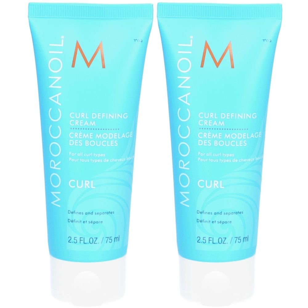 Zwei blaue Tuben mit weißem Verschluss. Aufschrift: Moroccanoil, Curl Defining Cream, Creme Modelage des Boucles. 2.5 FL.OZ/75ml.