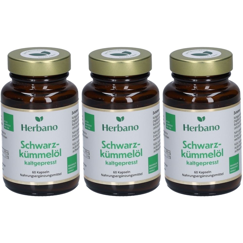 Trois flacons en verre brun avec des couvercles dorés. Les étiquettes indiquent "Herbano Schwarzkümmelöl kaltgepresst". Chaque flacon contient 60 gélules.
