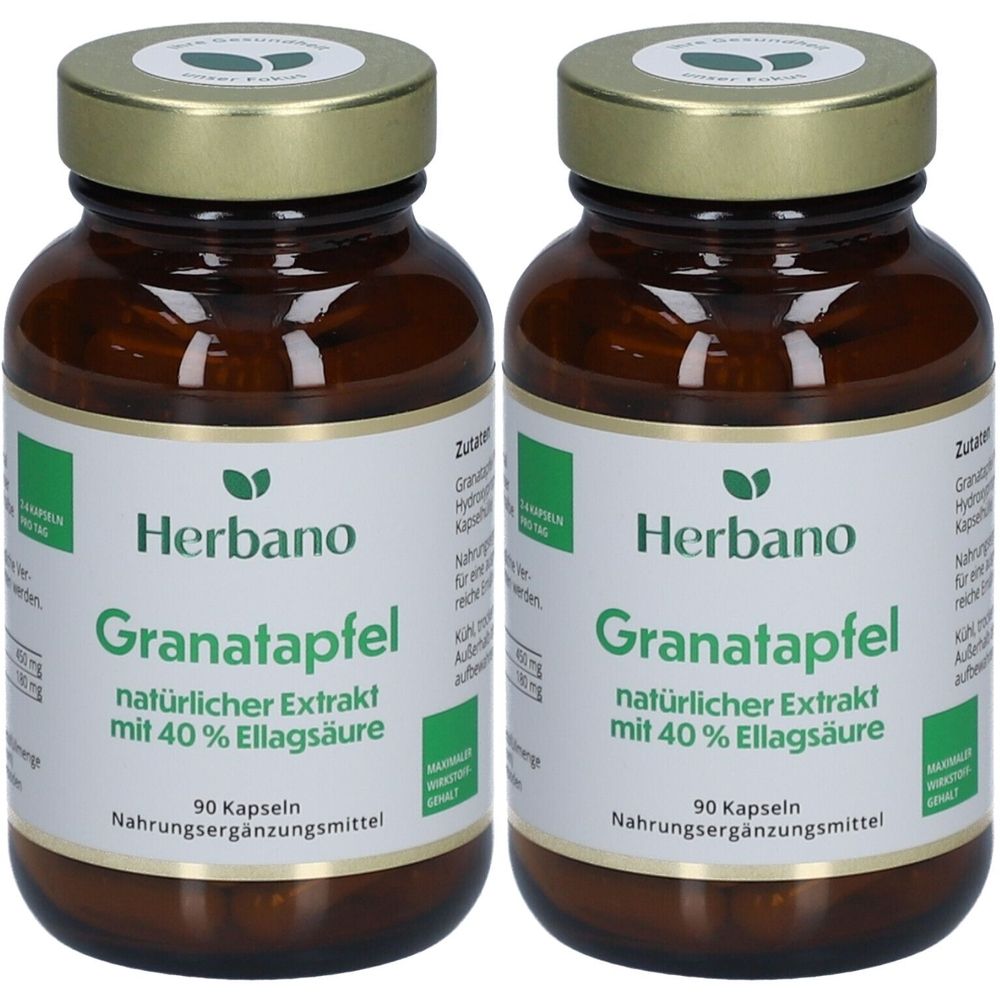 Zwei braune Glasflaschen mit goldenen Deckeln. Auf den Etiketten steht "Herbano Granatapfel" und weitere Informationen.