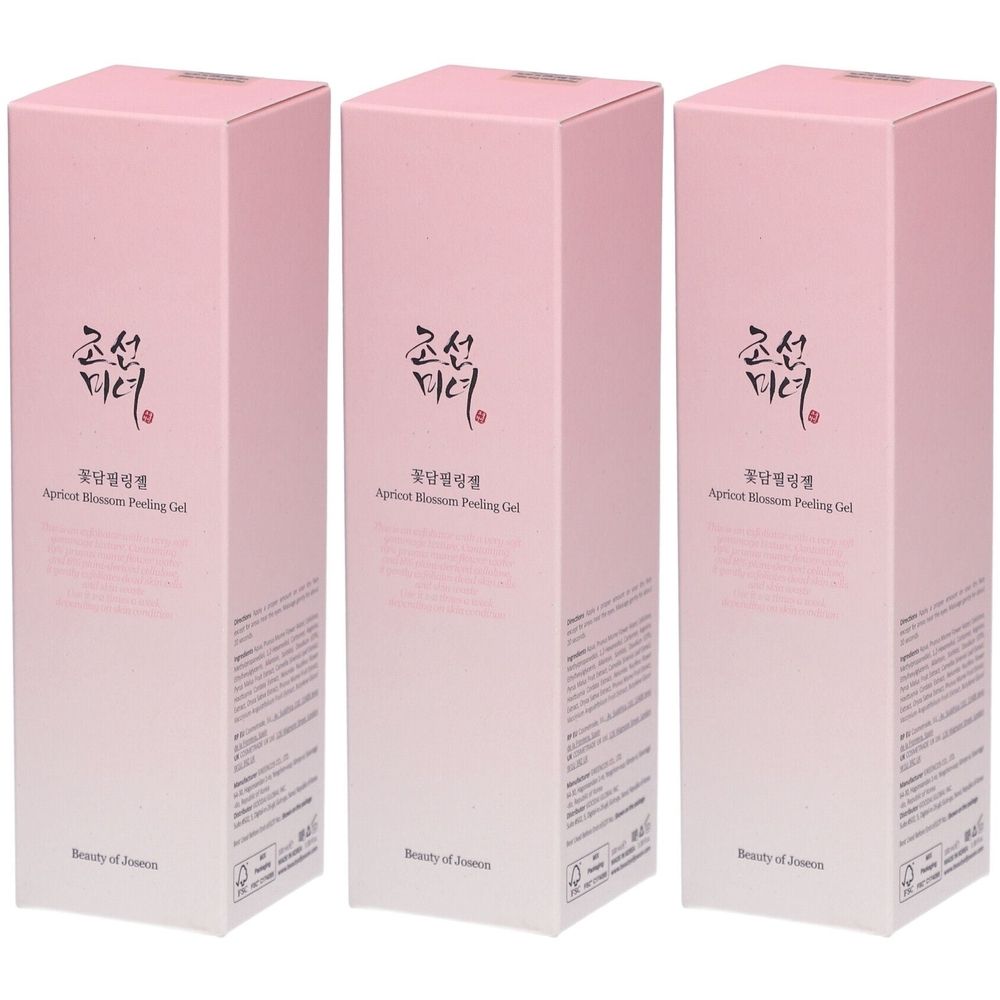 Drei rosa Verpackungen. Aufschrift in asiatischer Schrift und englisch: Apricot Blossom Peeling Gel. Marke: Beauty of Joseon.