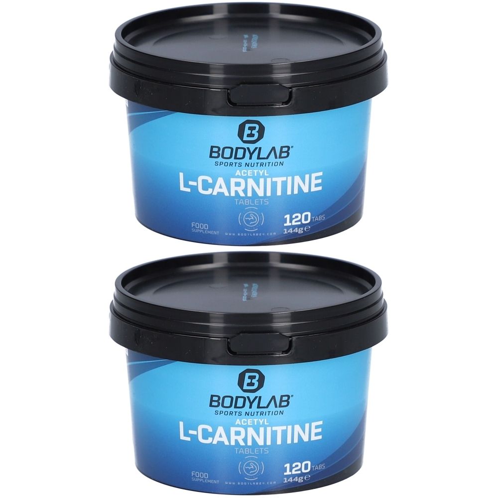 Deux boîtes bleues avec couvercles noirs. Inscription : BODYLAB, L-CARNITINE, 120 comprimés. Nutrition sportive.