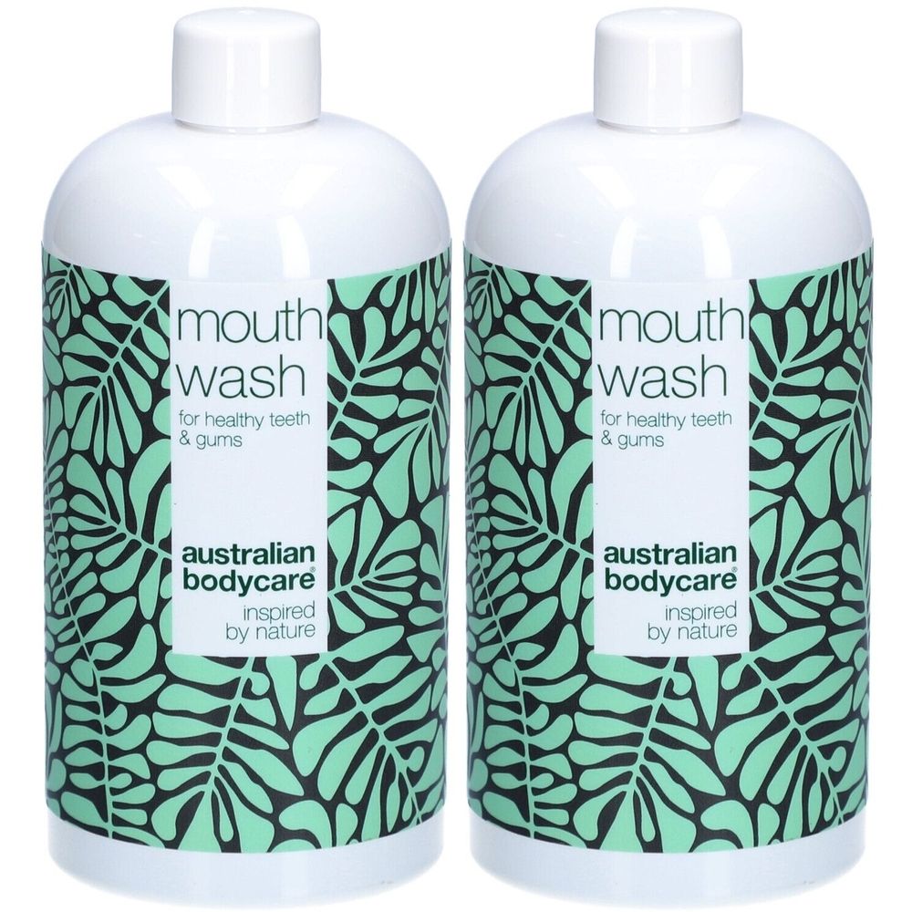 Deux flacons blancs de bain de bouche avec motif de feuilles vertes. Inscription : mouth wash, australian bodycare.