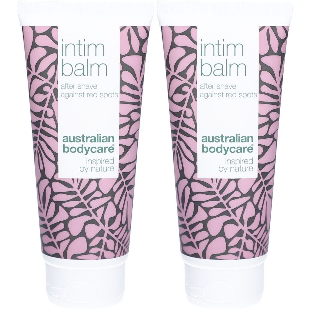 Zwei Tuben Intim-Balsam. Weiß, mit rosa floralem Muster. Schriftzug: Intim Balm, after shave against red spots, Australian Bodycare.
