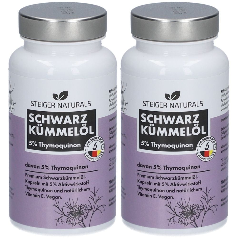 Deux flacons de capsules d'huile de cumin noir Steiger Naturals. Flacons blancs avec couvercles argentés et étiquettes violettes avec texte.