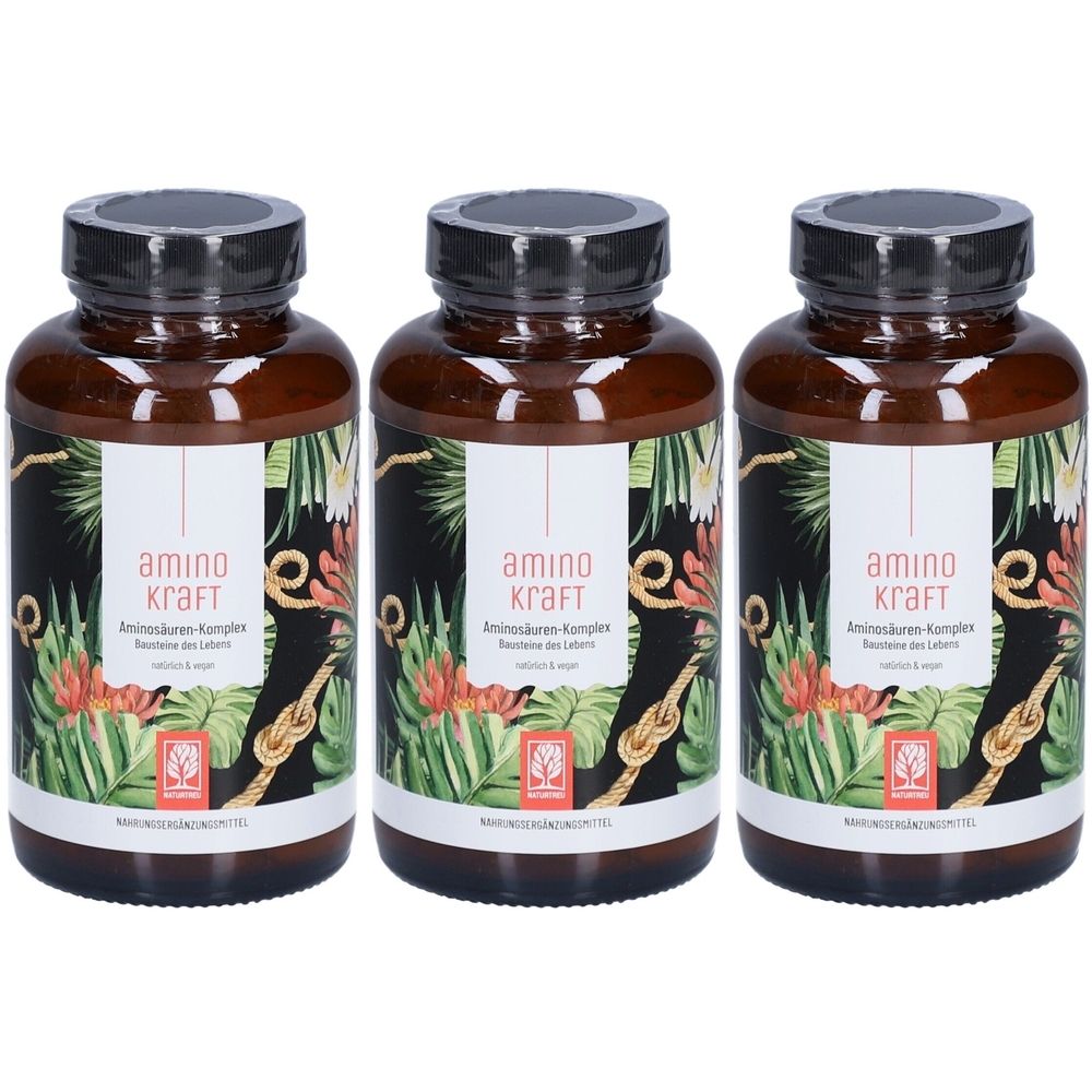 Trois flacons bruns avec des couvercles noirs. Étiquettes avec "amino kraft". Décoration de plantes et chaîne dorée.