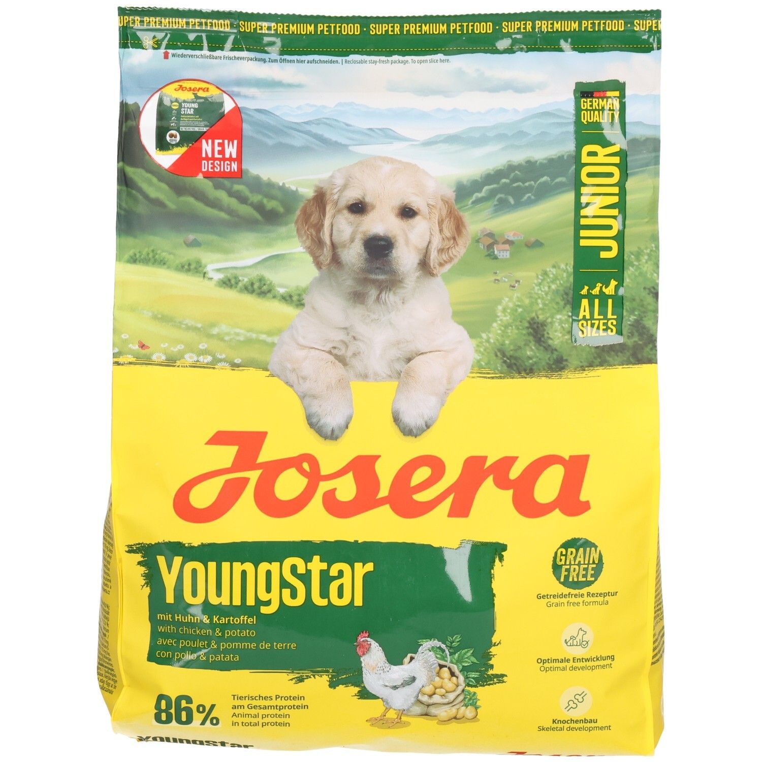 Emballage jaune avec image de chiot. Inscription: JOSERA YoungStar Junior avec poulet et pommes de terre. Détails vert-jaune. Contient 86% de protéines animales.