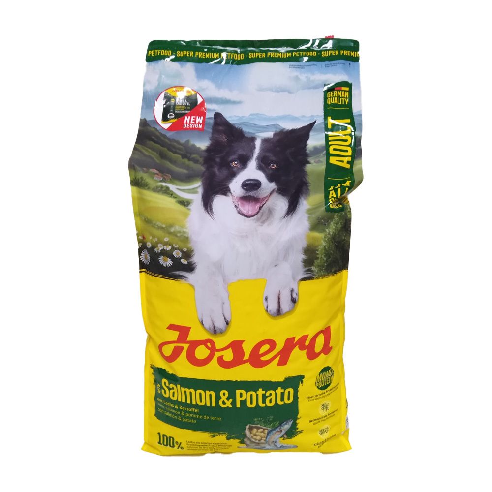 Gelber Beutel mit Hund. Aufschrift "JOSERA Salmon & Potato". Grün-gelbe Details. "ADULT" und "100%" sichtbar.