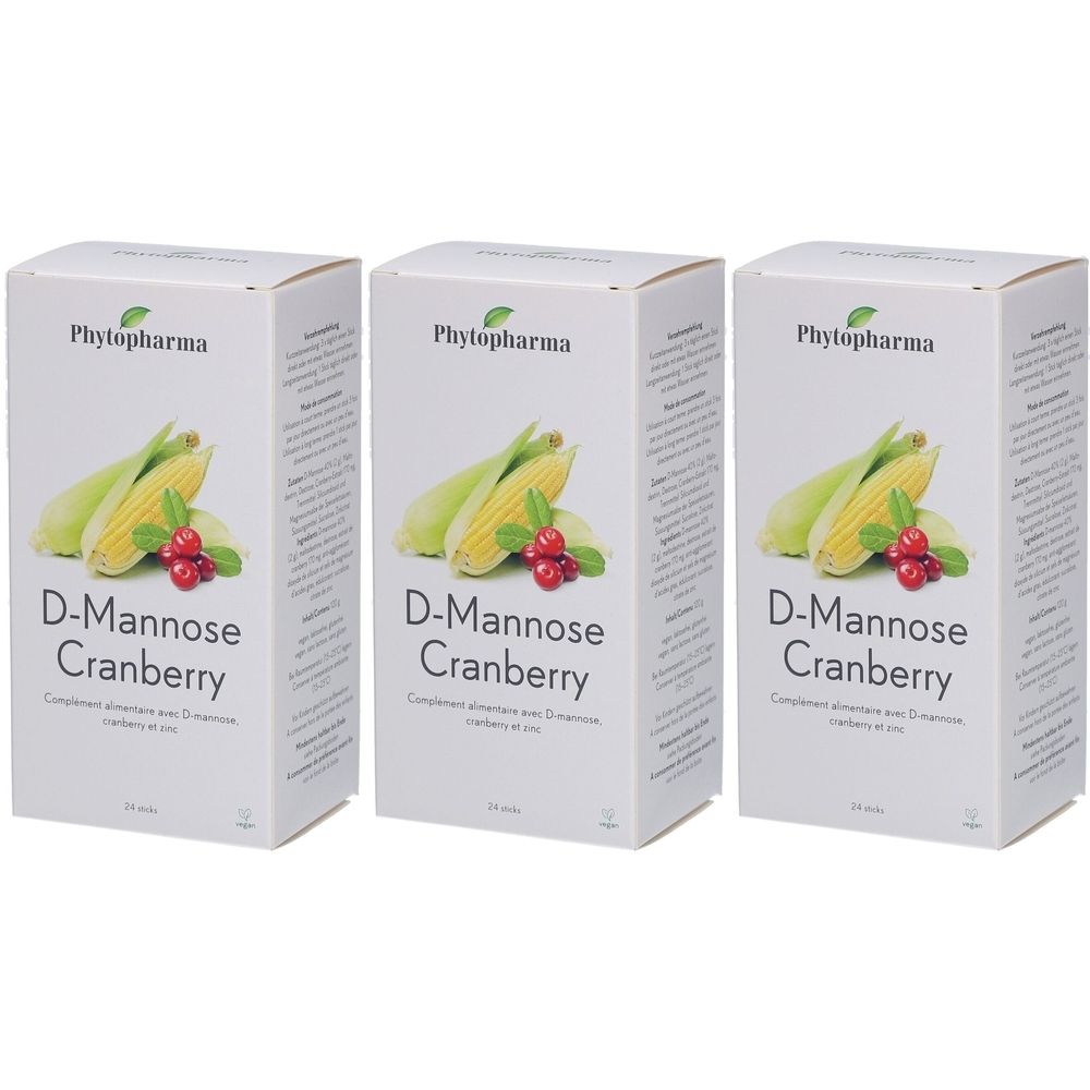 Trois boîtes blanches avec impression du produit. Inscription: Phytopharma, D-Mannose Cranberry. Illustration: épis de maïs, canneberges.