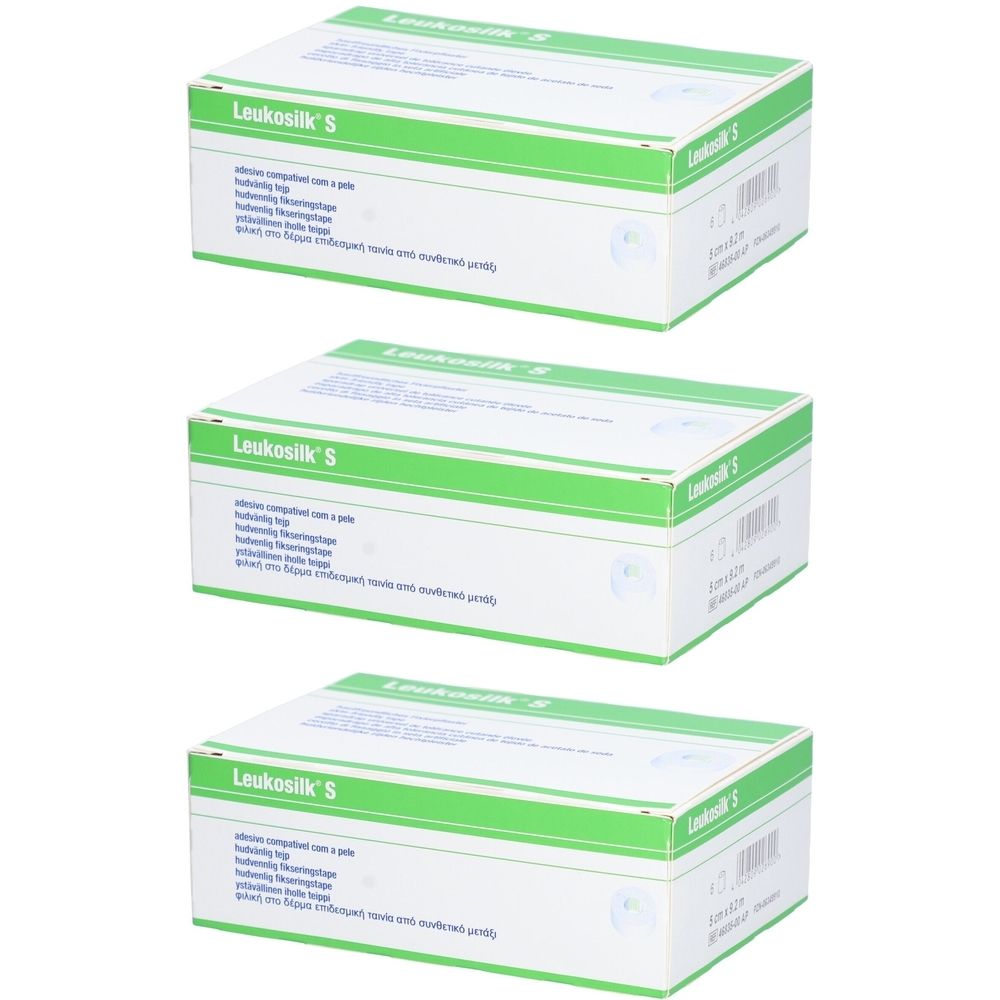 Trois boîtes blanches avec des bandes vertes. Inscription: Leukosilk S. Texte en plusieurs langues.