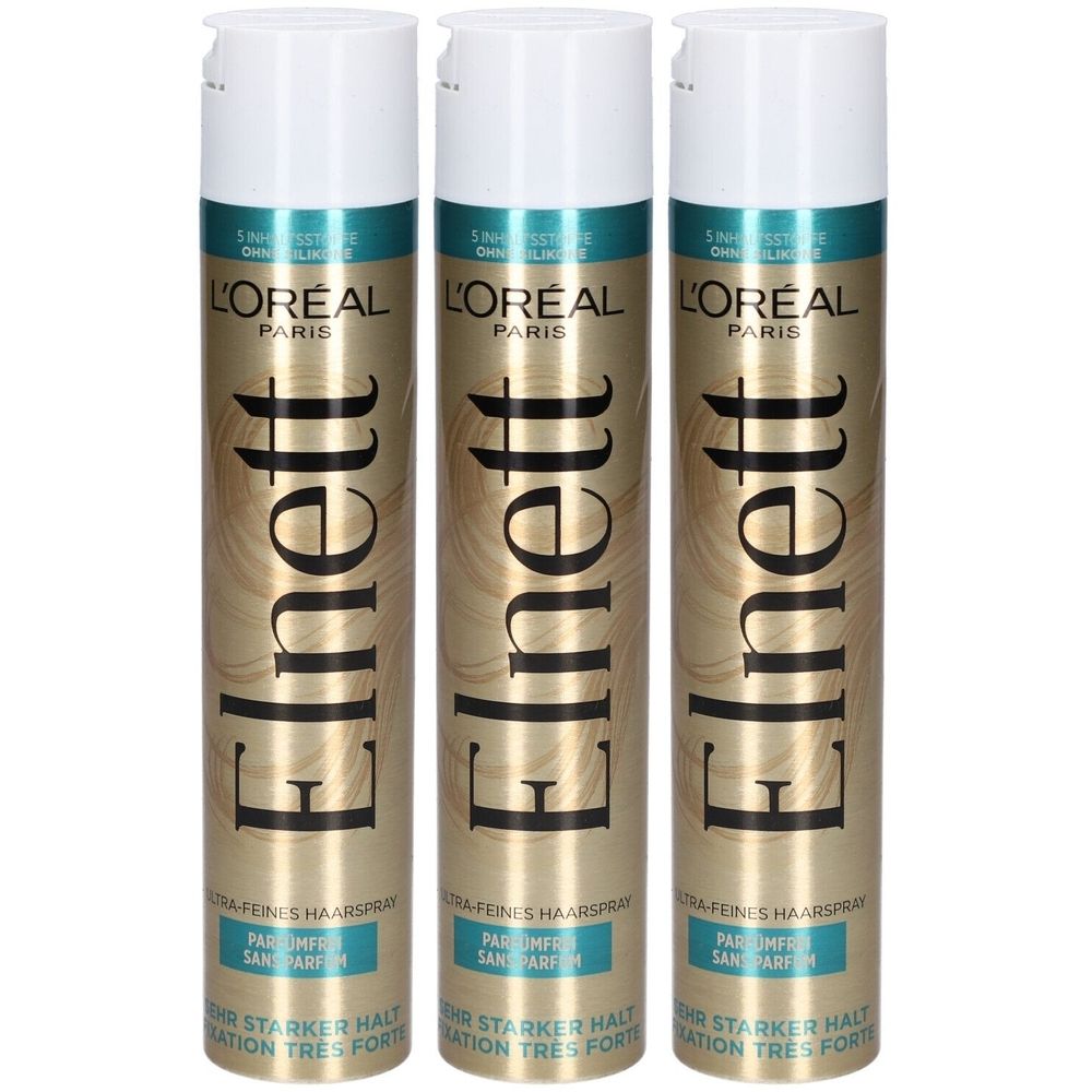 Drei Haarspray-Dosen. Goldfarbene Dosen mit weißem Deckel. Aufschrift: Elnett, L'Oréal Paris, ohne Parfum, extra starker Halt.