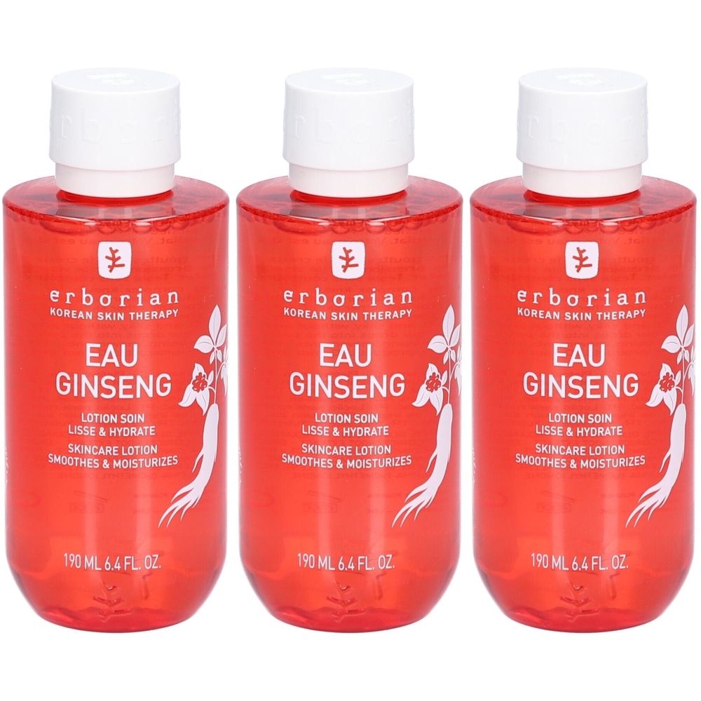 Trois flacons de lotion Erborian Eau Ginseng. Liquide rouge dans des flacons transparents avec bouchon blanc. Texte: Eau Ginseng, Skincare Lotion.